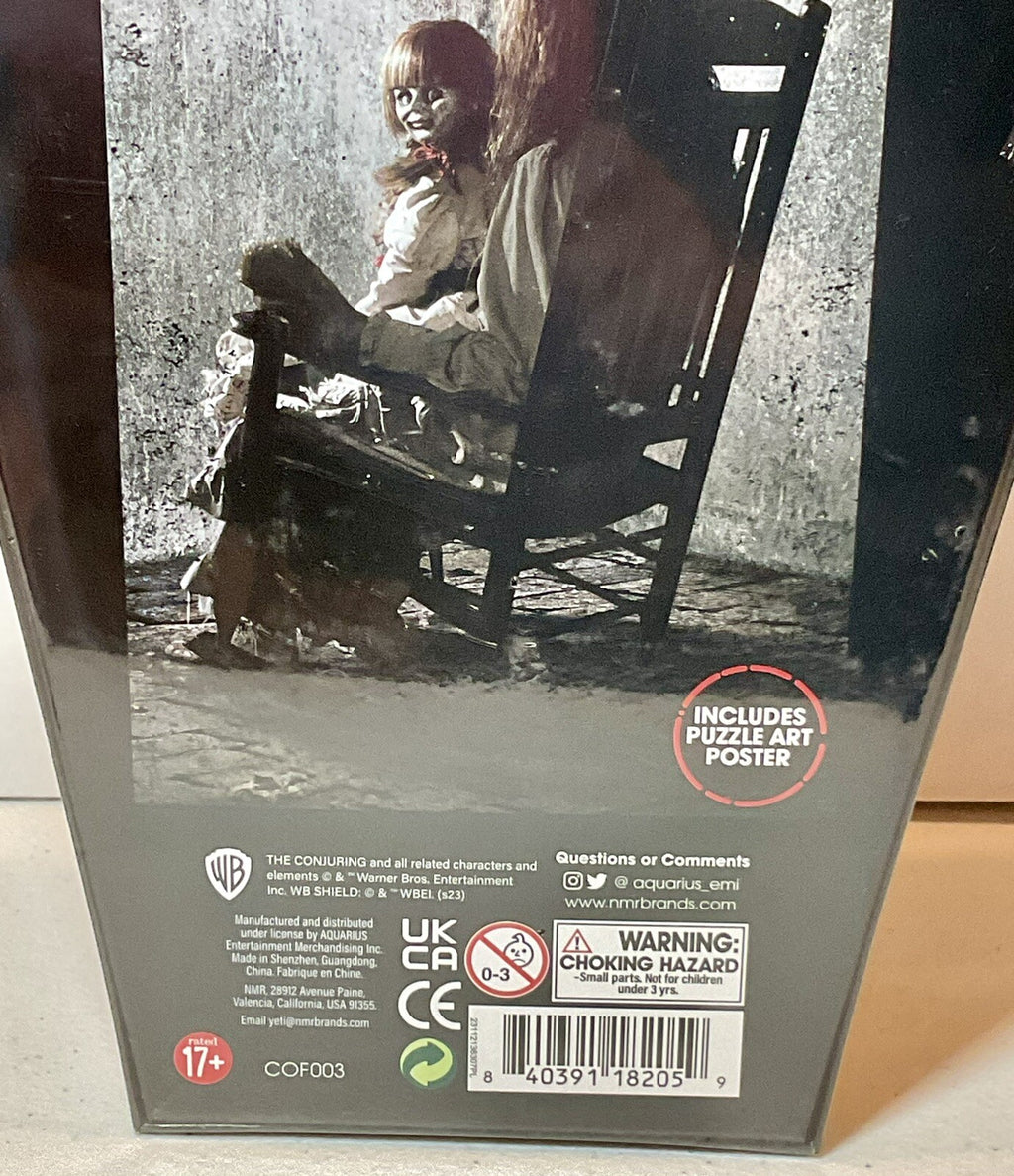 The Conjuring 500 Piece Puzzle Coffin Shaped Box includes Puzzle Art Poster