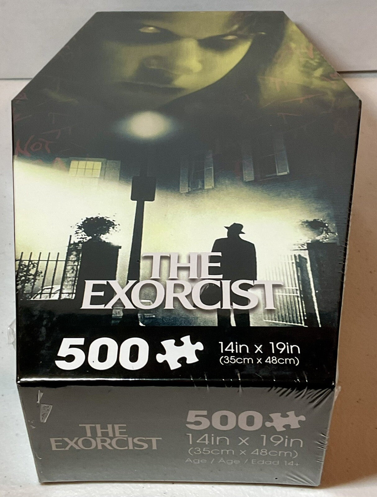 The Exorcist 500 Piece Puzzle Coffin Shaped Box includes Puzzle Art Poster