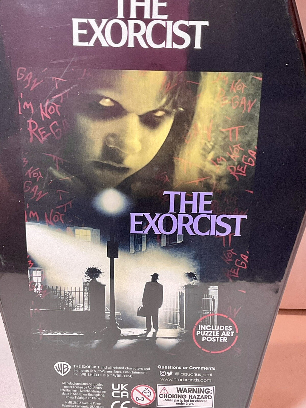 The Exorcist 500 Piece Puzzle Coffin Shaped Box includes Puzzle Art Poster