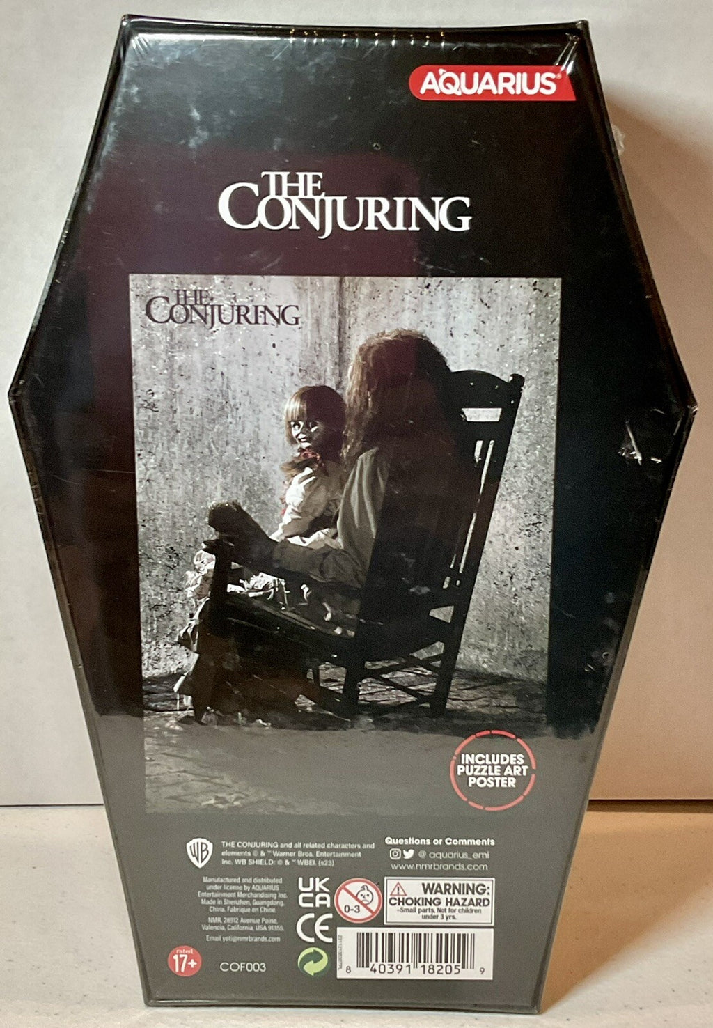 The Conjuring 500 Piece Puzzle Coffin Shaped Box includes Puzzle Art Poster