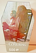 The Conjuring 500 Piece Puzzle Coffin Shaped Box includes Puzzle Art Poster
