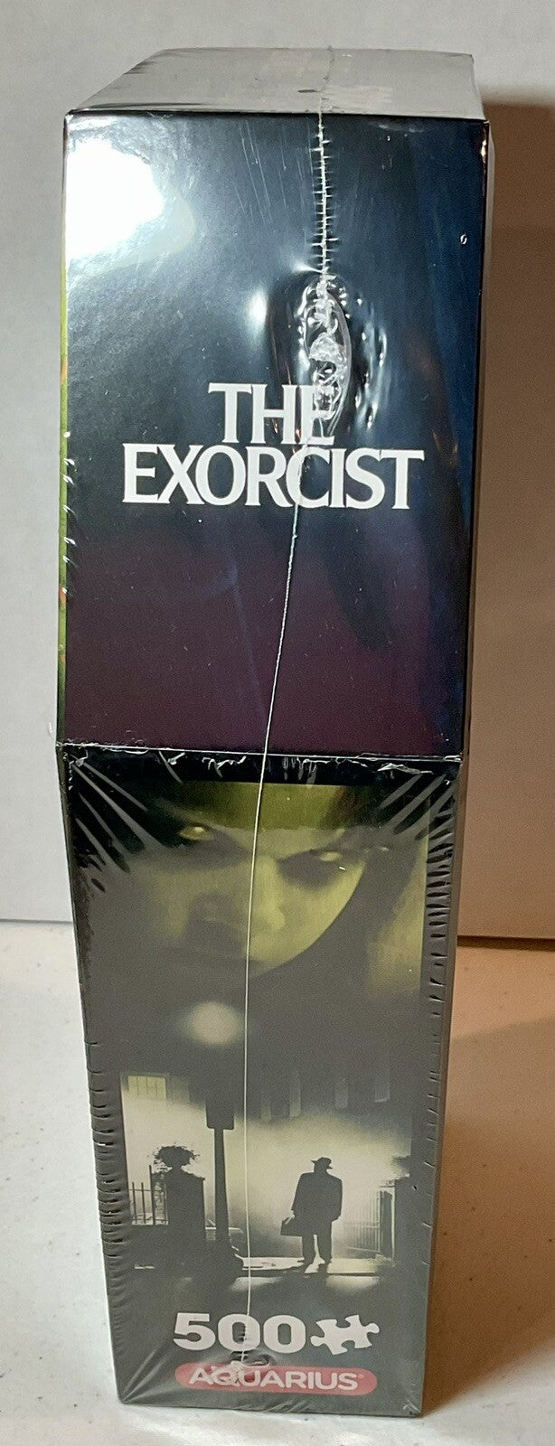 The Exorcist 500 Piece Puzzle Coffin Shaped Box includes Puzzle Art Poster