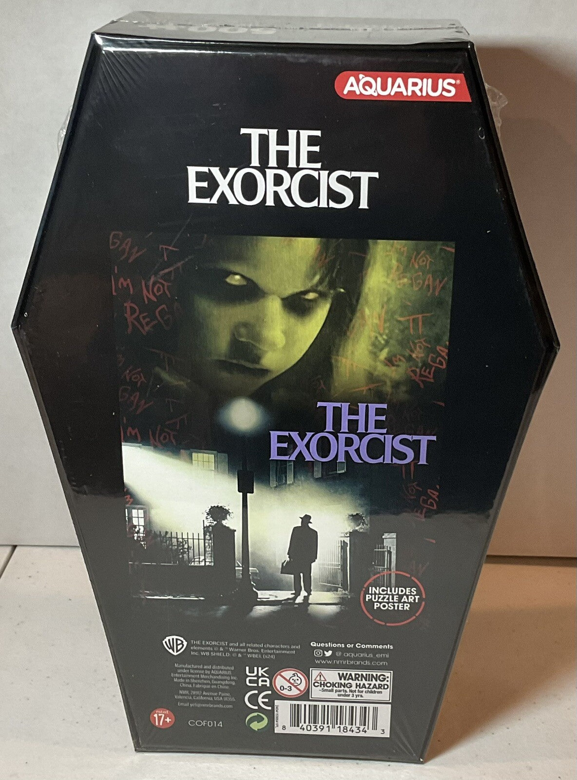 The Exorcist 500 Piece Puzzle Coffin Shaped Box includes Puzzle Art Poster
